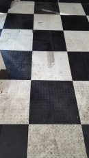 Badly stained and soiled vinyl tiles